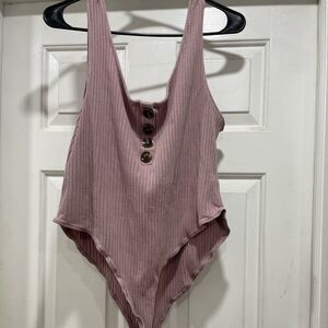 Fashion Nova Body Suit Mauve Sleeveless body suit. Stretchy snap close size 3X